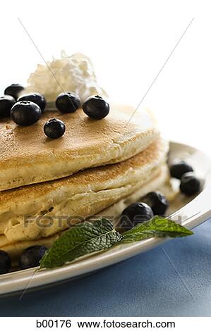 Close-up of pizza base and blackberries on a plate View Large Photo Image Stock Photograph - Close-up of pizza base and blackberries on a plate. Fotosearch