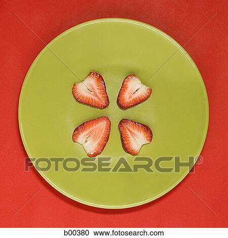 Close-up of slice of strawberry on a plate (Fragaria virginiana) View Large Photo Image Stock Image - Close-up of slice of strawberry on a plate (Fragaria virginiana). Fotosearch