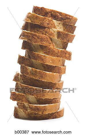 Close-up of stacked slices of brown bread View Large Photo Image Stock Photo - Close-up of stacked slices of brown bread. Fotosearch