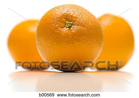 Stock Photo - Close-up of three oranges (citrus sinensis). Fotosearch