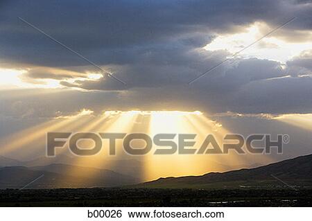 Dark cloud over a hilly landscape View Large Photo Image Stock Photograph - Dark cloud over a hilly landscape. Fotosearch
