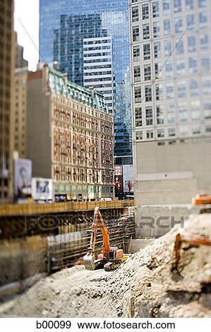 Stock Photo - Earth mover at the construction site. Fotosearch