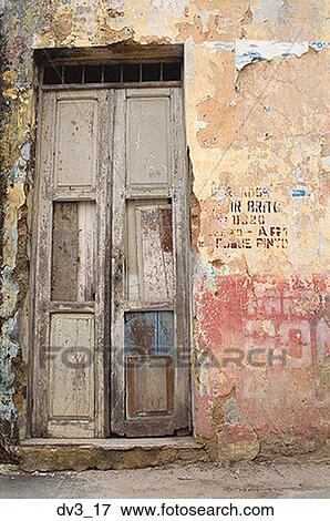 Stock Photo - Facade of a dilapidated doorway. Fotosearch
