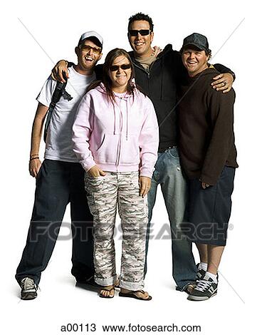 Stock Image - Four young friends standing, arm in arm. Fotosearch