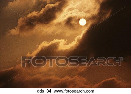Full moon in the sky with puffy clouds View Large Photo Image Picture - Full moon in the sky with puffy clouds. Fotosearch