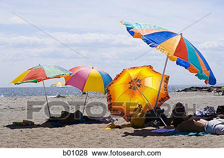 Group of people on the beach View Large Photo Image Stock Photo - Group of people on the beach. Fotosearch