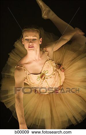 Stock Photo - High angle view of a ballerina in tutu dancing. Fotosearch