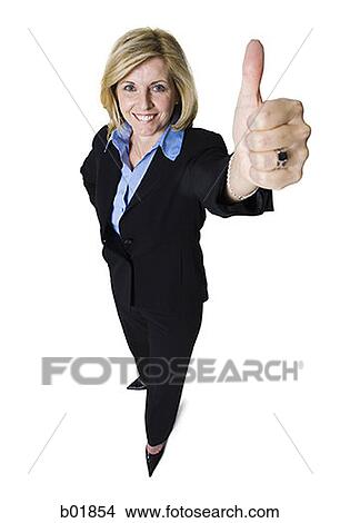 Picture - High angle view of a businesswoman showing thumbs up sign. Fotosearch