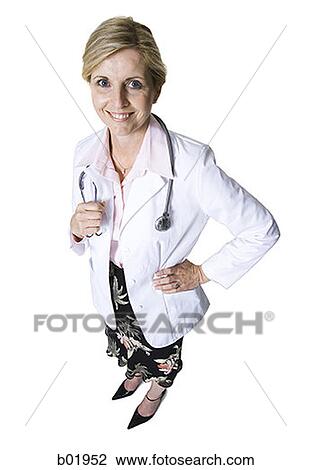 High angle view of a female doctor standing with her hand on her hip View Large Photo Image Stock Image - High angle view of a female doctor standing with her hand on her hip. Fotosearch