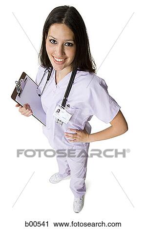 High angle view of a female nurse holding a clipboard View Large Photo Image Stock Image - High angle view of a female nurse holding a clipboard. Fotosearch