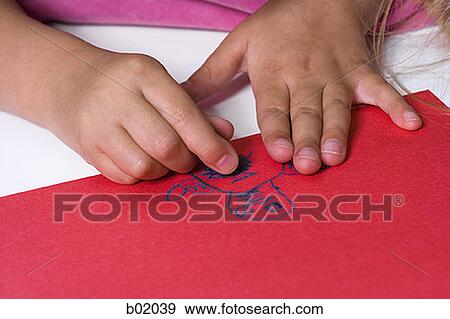 High angle view of a girl drawing on a chart using crayons View Large Photo Image Stock Photo - High angle view of a girl drawing on a chart using crayons. Fotosearch