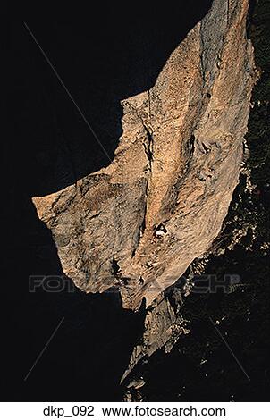 High angle view of a person rock climbing View Large Photo Image Stock Image - High angle view of a person rock climbing. Fotosearch