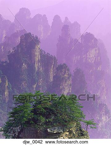 High angle view of a tree-covered mountain top and mountain range View Large Photo Image Stock Image - High angle view of a tree-covered mountain top and mountain range. Fotosearch