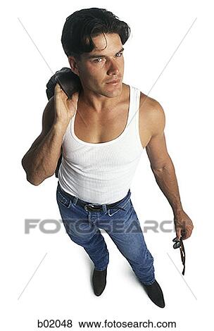 High angle view of a young man standing View Large Photo Image Stock Photo - High angle view of a young man standing. Fotosearch