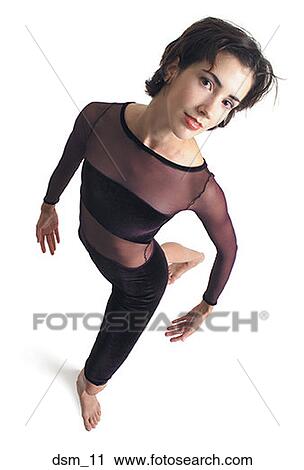 Stock Image - High angle view of a young woman dancing. Fotosearch