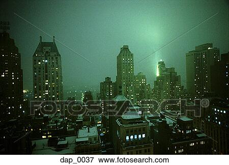 High angle view of buildings in a city at night View Large Photo Image Stock Photo - High angle view of buildings in a city at night. Fotosearch