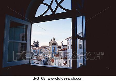 High angle view of buildings through a window View Large Photo Image Stock Photo - High angle view of buildings through a window. Fotosearch