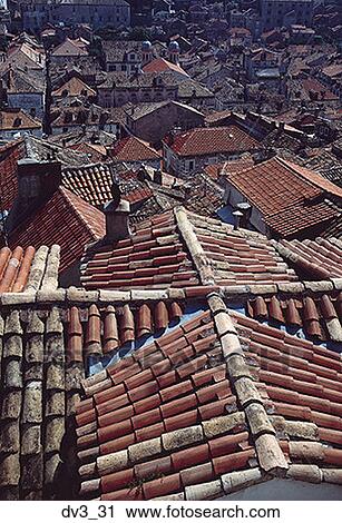 High angle view of rooftops of buildings in a town View Large Photo Image Stock Image - High angle view of rooftops of buildings in a town. Fotosearch