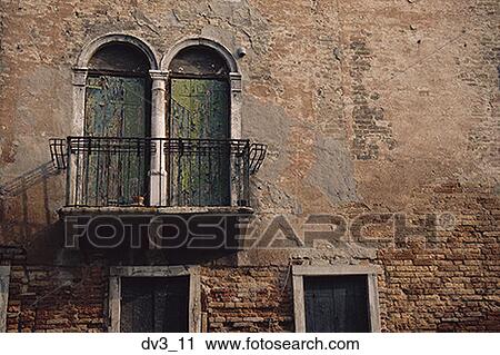 Low angle view of a balcony of a building View Large Photo Image Stock Image - Low angle view of a balcony of a building. Fotosearch