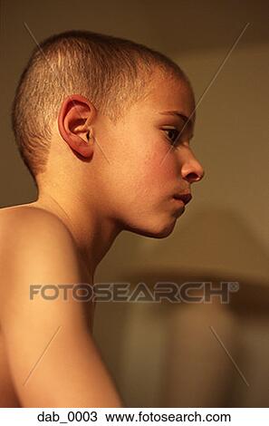 Stock Image - Low angle view of a boy. Fotosearch