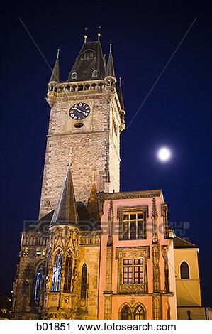 Low angle view of a clock tower at night View Large Photo Image Stock Image - Low angle view of a clock tower at night. Fotosearch