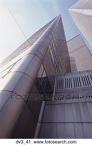 Stock Image - Low angle view of a commercial building. Fotosearch