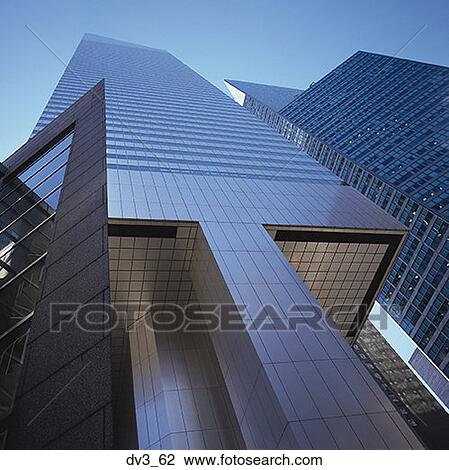 Stock Image - Low angle view of a commercial building. Fotosearch