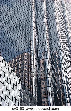 Stock Image - Low angle view of a commercial building. Fotosearch