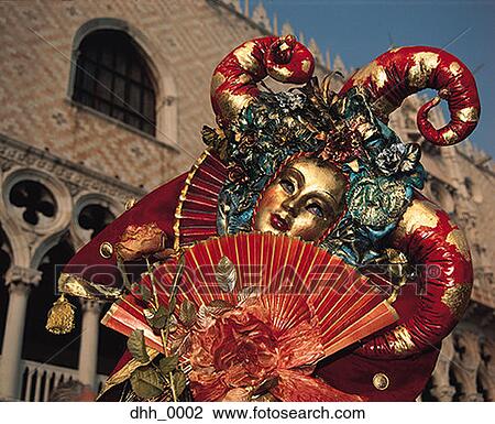 Low angle view of a person standing in a masquerade costume View Large Photo Image Stock Image - Low angle view of a person standing in a masquerade costume. Fotosearch