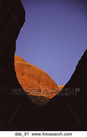 Low angle view of a rock formation in a desert View Large Photo Image Stock Image - Low angle view of a rock formation in a desert. Fotosearch