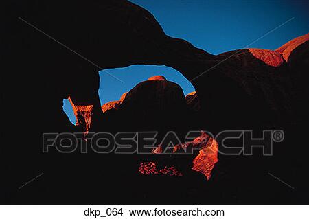 Picture - Low angle view of a silhouette of an arch. Fotosearch
