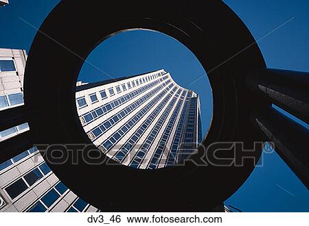 Low angle view of a skyscraper View Large Photo Image Stock Photograph - Low angle view of a skyscraper. Fotosearch