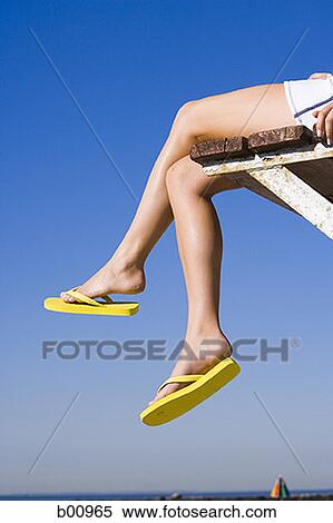 Stock Photography - Low angle view of a woman's legs. Fotosearch