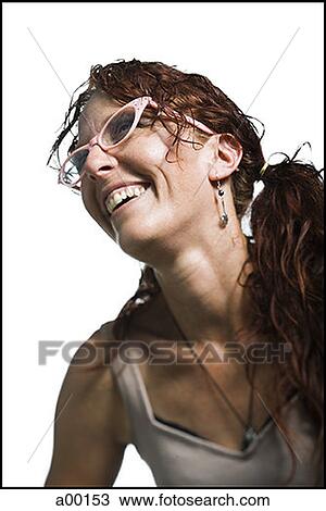 Low angle view of an adult woman laughing View Large Photo Image Stock Image - Low angle view of an adult woman laughing. Fotosearch