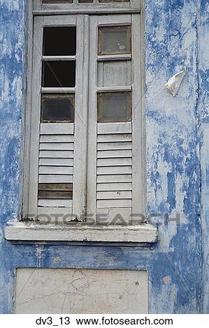 Low angle view of broken shutter of a window View Large Photo Image Stock Image - Low angle view of broken shutter of a window. Fotosearch