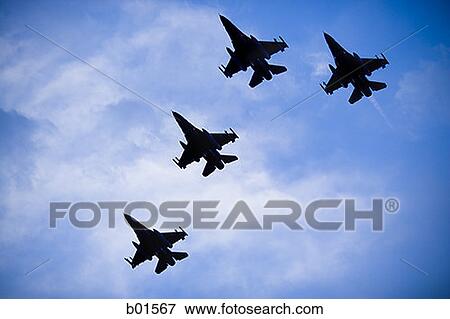Low angle view of military aircrafts flying in the sky View Large Photo Image Stock Photo - Low angle view of military aircrafts flying in the sky. Fotosearch