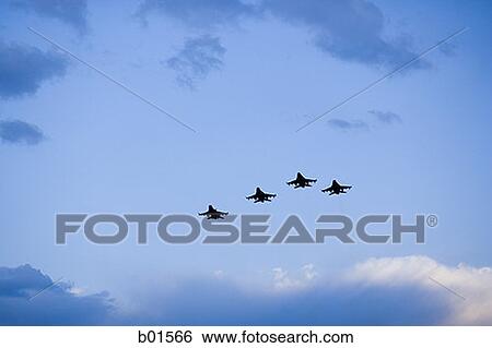 Low angle view of military aircrafts flying in the sky View Large Photo Image Stock Photograph - Low angle view of military aircrafts flying in the sky. Fotosearch