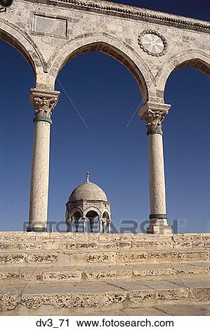 Stock Image - Low angle view of steps leading to a archway. Fotosearch