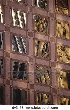 Low angle view of the reflection of a building on glass View Large Photo Image Stock Photo - Low angle view of the reflection of a building on glass. Fotosearch