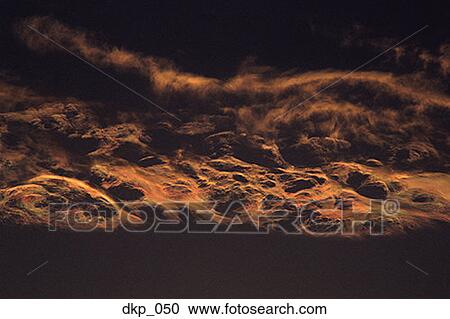 Low angle view of the sky at dusk View Large Photo Image Stock Image - Low angle view of the sky at dusk. Fotosearch