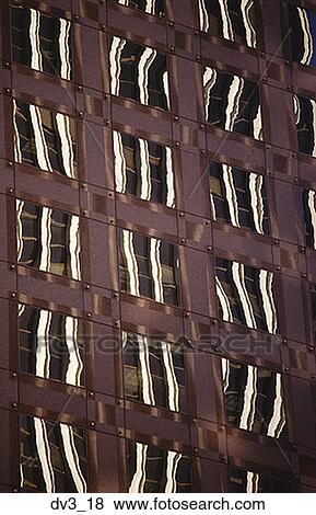Low angle view of windows of a building View Large Photo Image Stock Photo - Low angle view of windows of a building. Fotosearch