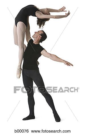 Male ballet dancer lifting a female ballerina View Large Photo Image Stock Photograph - Male ballet dancer lifting a female ballerina. Fotosearch