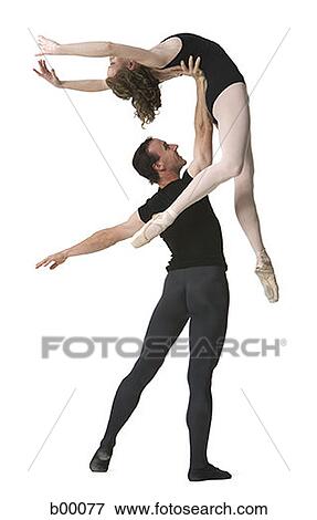 Male ballet dancer supporting a female ballerina View Large Photo Image Stock Photo - Male ballet dancer supporting a female ballerina. Fotosearch