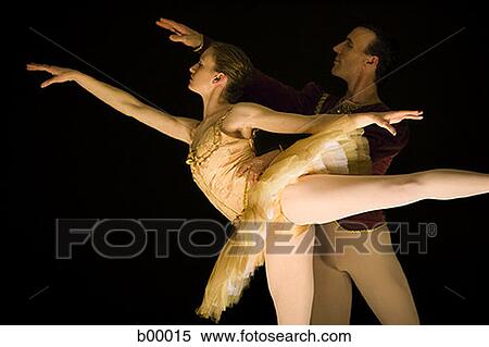Stock Photography - Male ballet dancer supporting a female ballerina. Fotosearch