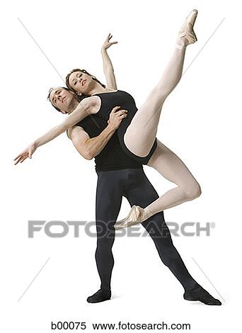 Stock Photography - Male ballet dancer supporting a female ballerina. Fotosearch