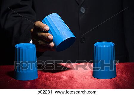 Man playing the shell game / closeup. View Large Photo Image Stock Image - Man playing the shell game / closeup.. Fotosearch