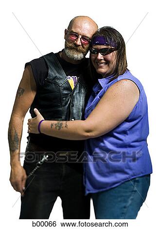 Mature woman embracing a mature man View Large Photo Image Stock Photograph - Mature woman embracing a mature man. Fotosearch