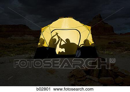 Men and women sitting in a tent View Large Photo Image Stock Image - Men and women sitting in a tent. Fotosearch