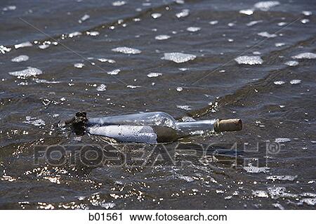 Message in a bottle washed up on shore View Large Photo Image Stock Image - Message in a bottle washed up on shore. Fotosearch