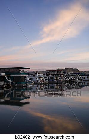 Panoramic view of boathouses in a row View Large Photo Image Stock Image - Panoramic view of boathouses in a row. Fotosearch